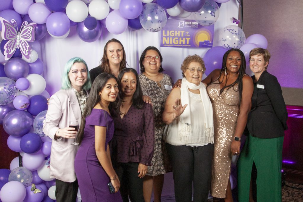 Bea Mendez Robinson with NDS staff at Light Up the Night, October 2022.